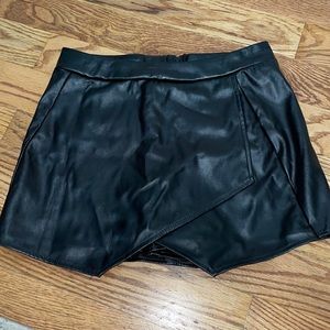 Black faux leather skort